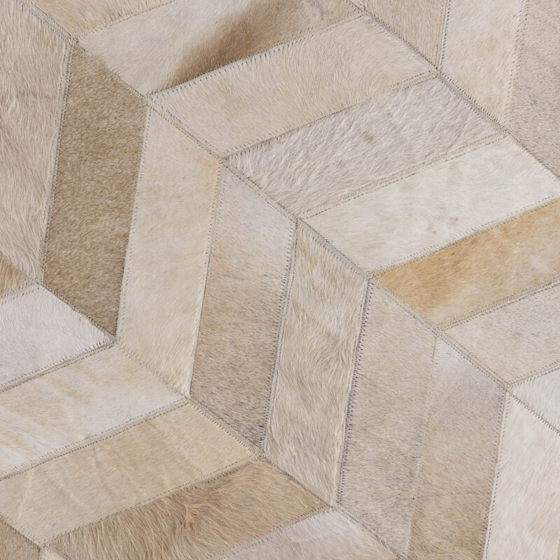 PTMD Joanne Beige cowhair patchwork vloerkleed rond 200 cm detail